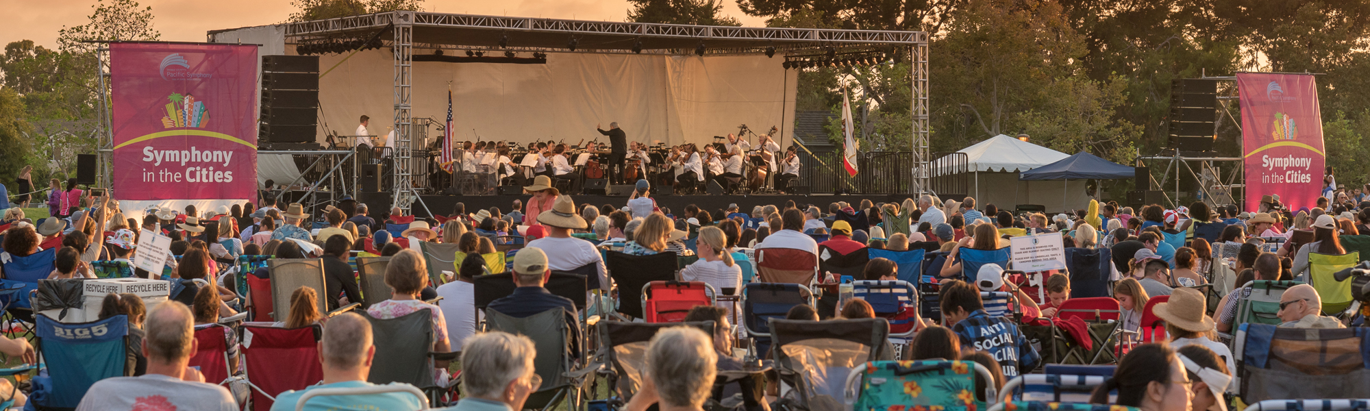 Symphony in the Cities stage with orchestra and audience
