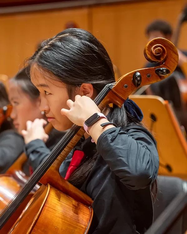 Members of Pacific Symphony Santiago Strings playing cello