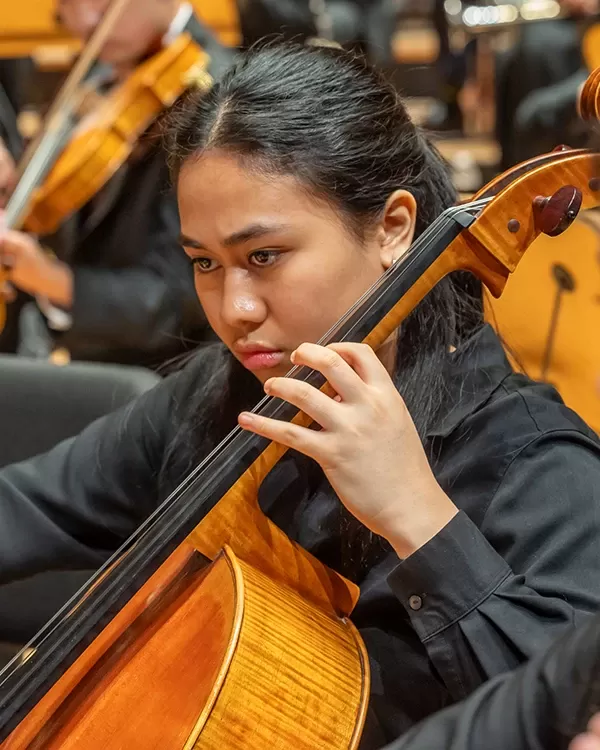 Cellist playing with Pacific Symphony Youth Orchestra