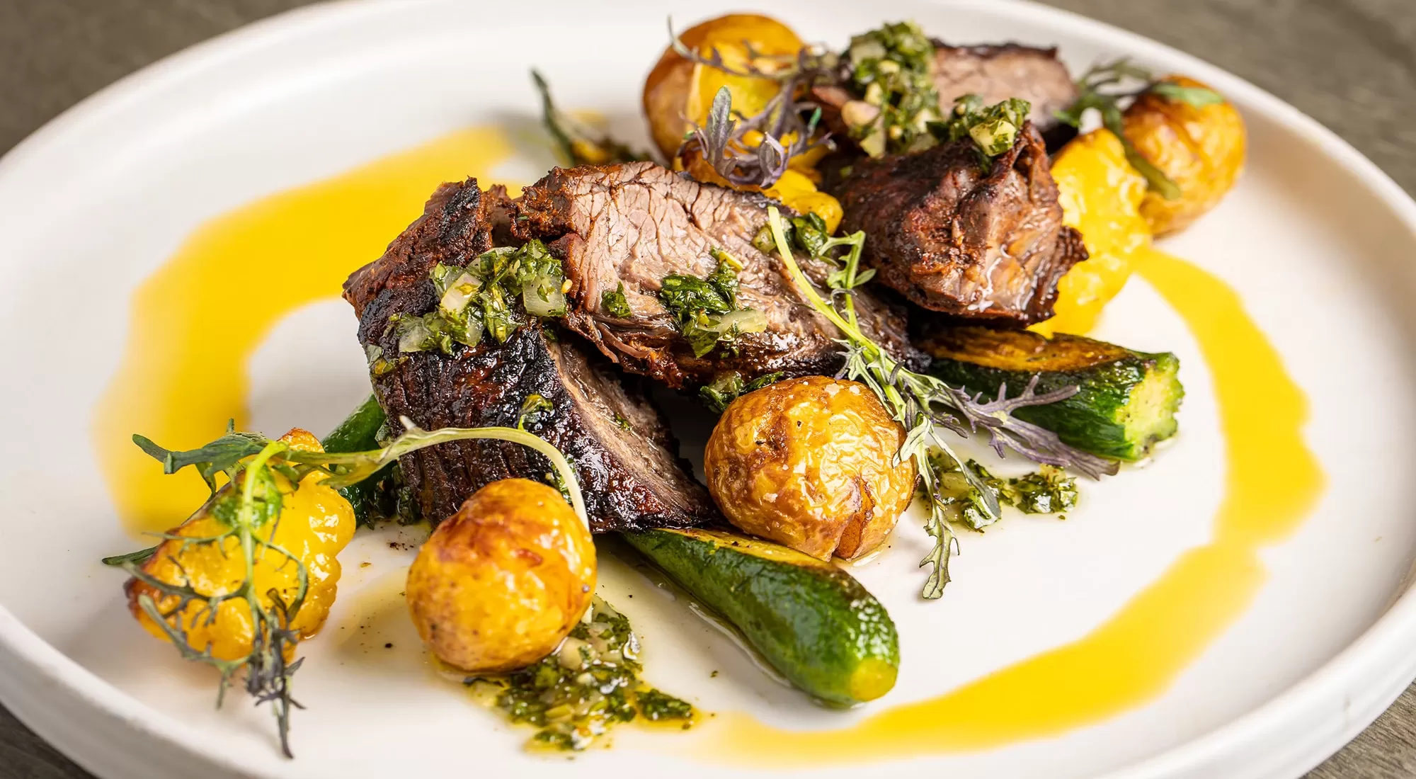 Steak, potatoes and vegetables