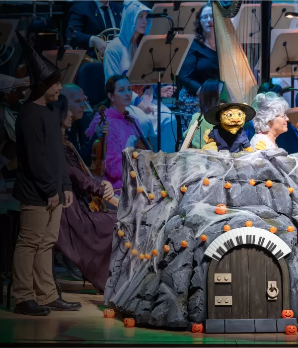 Leopold the leopard puppet on stage with Pacific Symphony